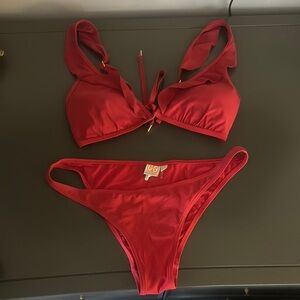 Tory Burch swimsuit size large top small bottom